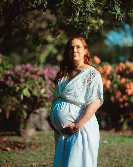 Expectant mother photographed in warm afternoon light