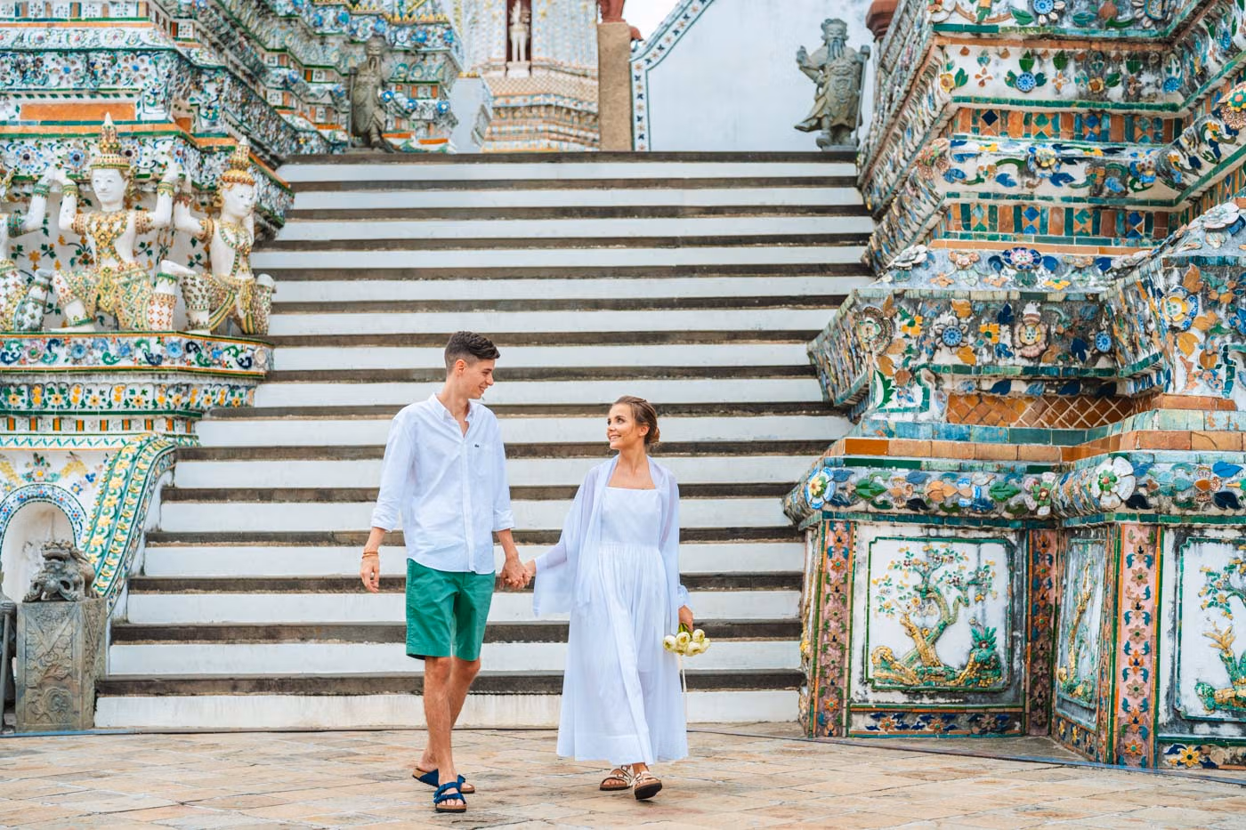 Woman in traditional Thai dress at Wat Arun