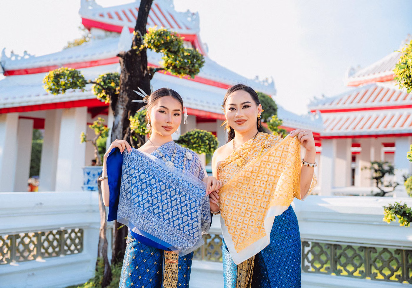 Visitor in traditional Thai costume at Wat Arun temple