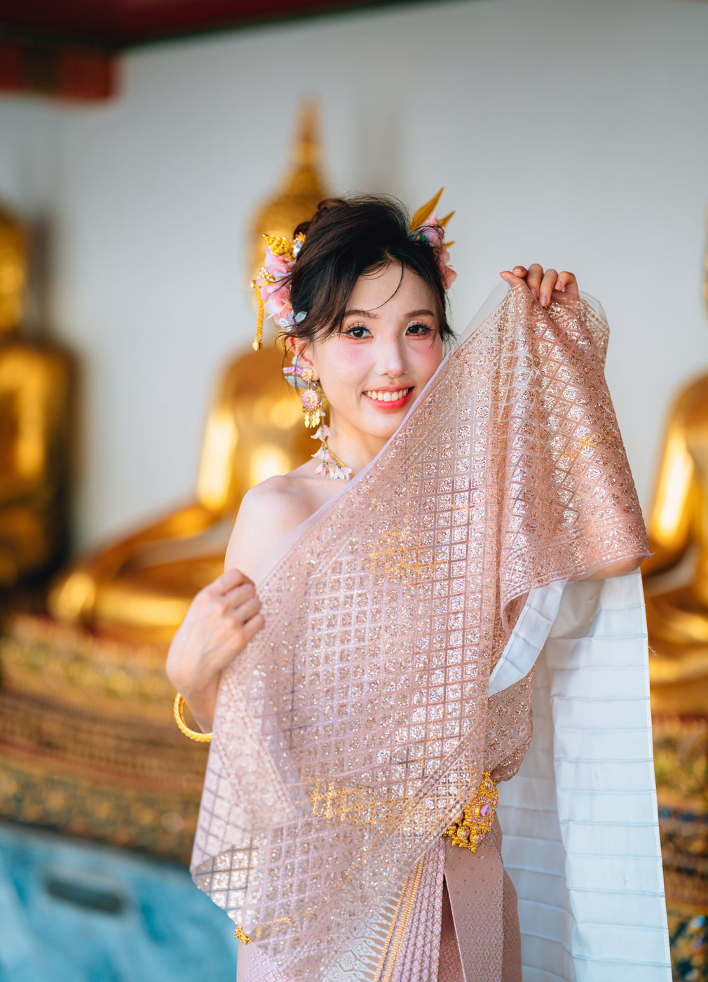 Traditional Thai costume at Bangkok temple