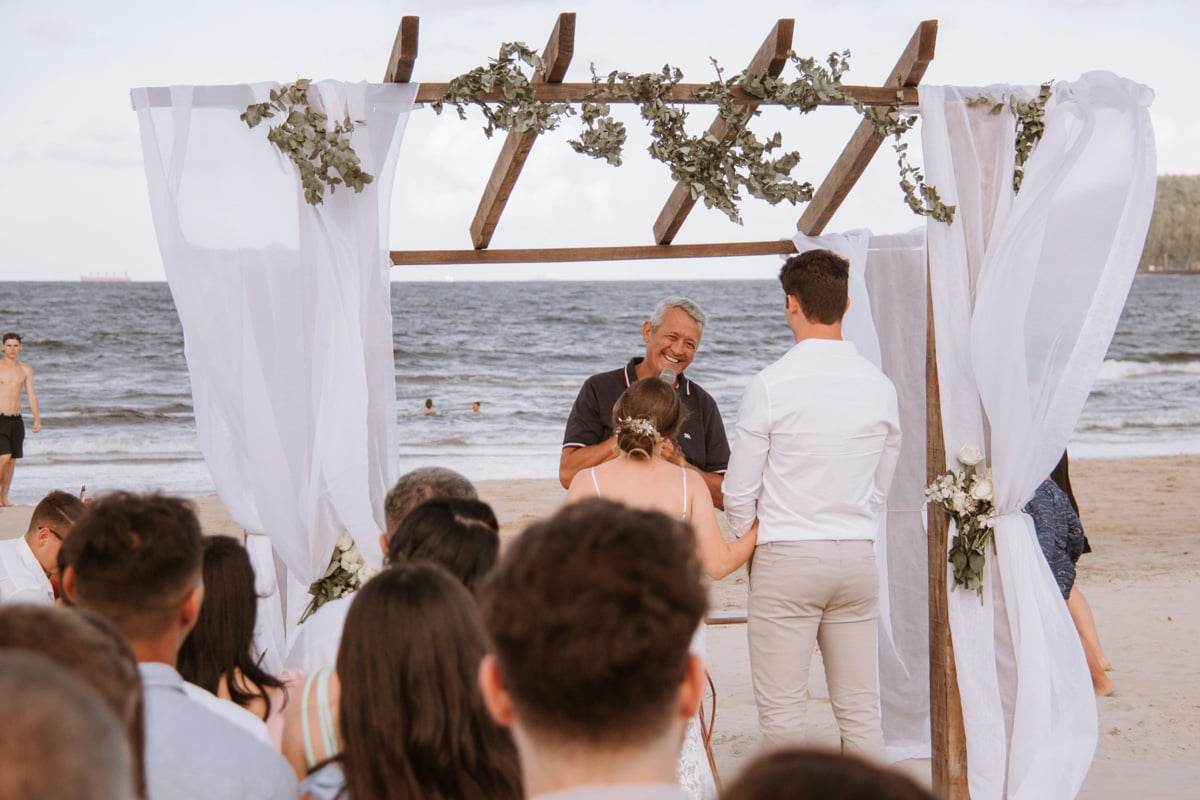 Beachside wedding ceremony in Thailand photographed by Lukfoto